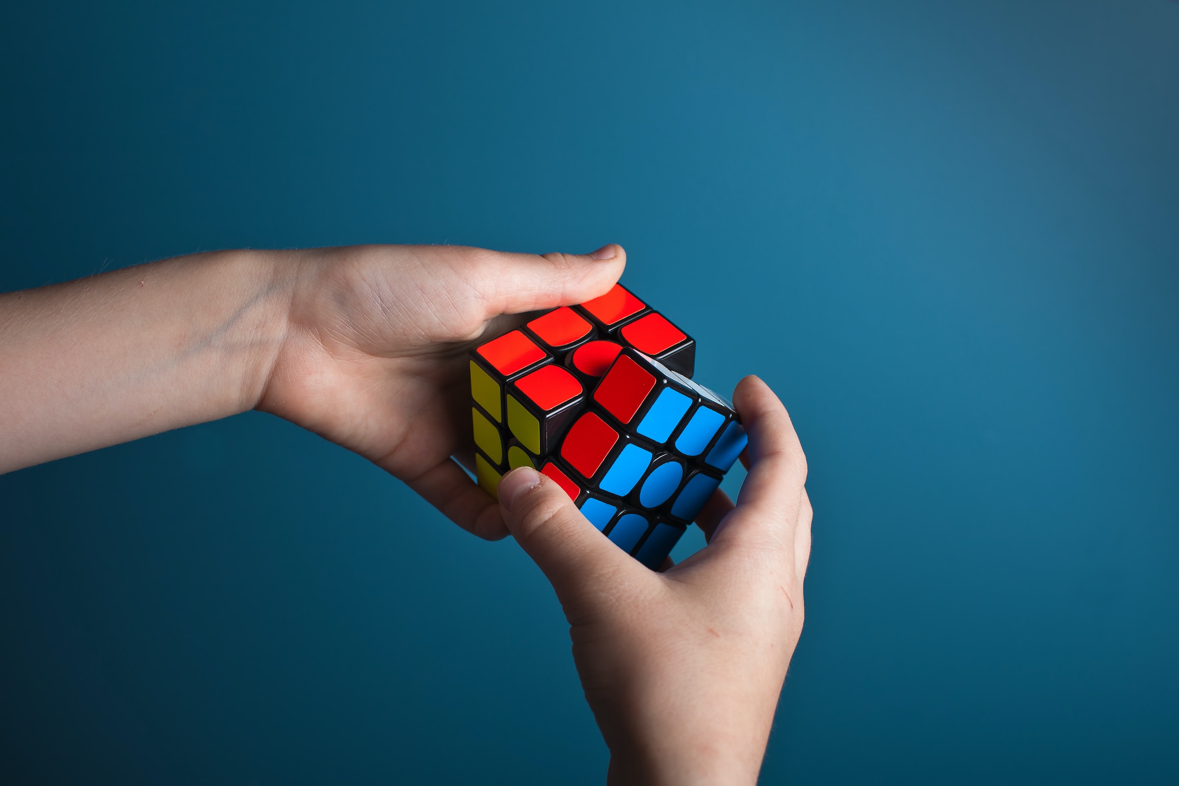 Person doing Rubik's cube