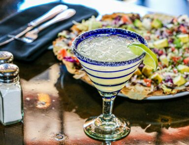 Margarita on table with food
