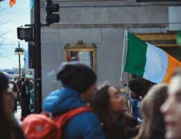 Person holding an Irish flag