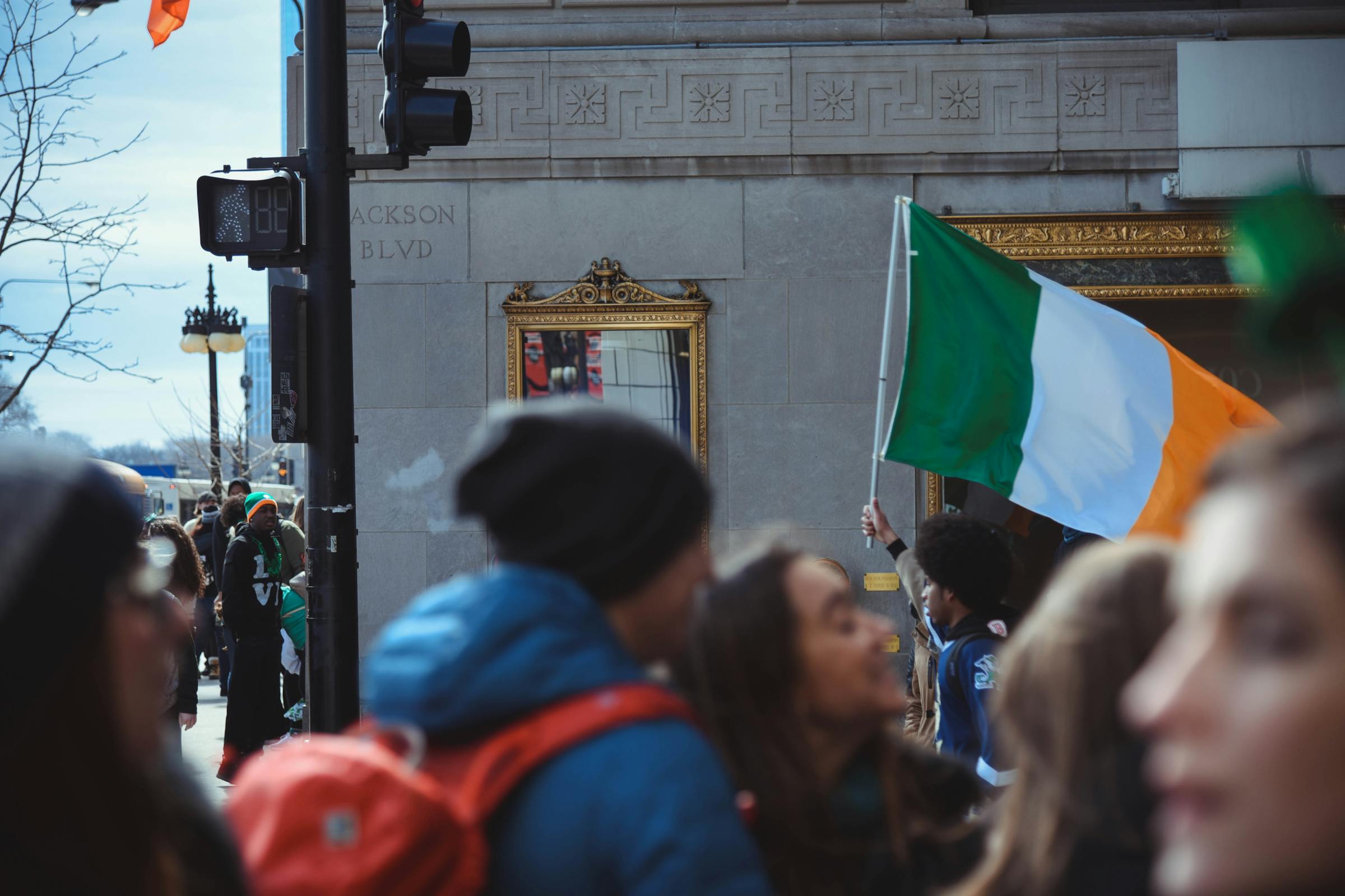 Person holding an Irish flag