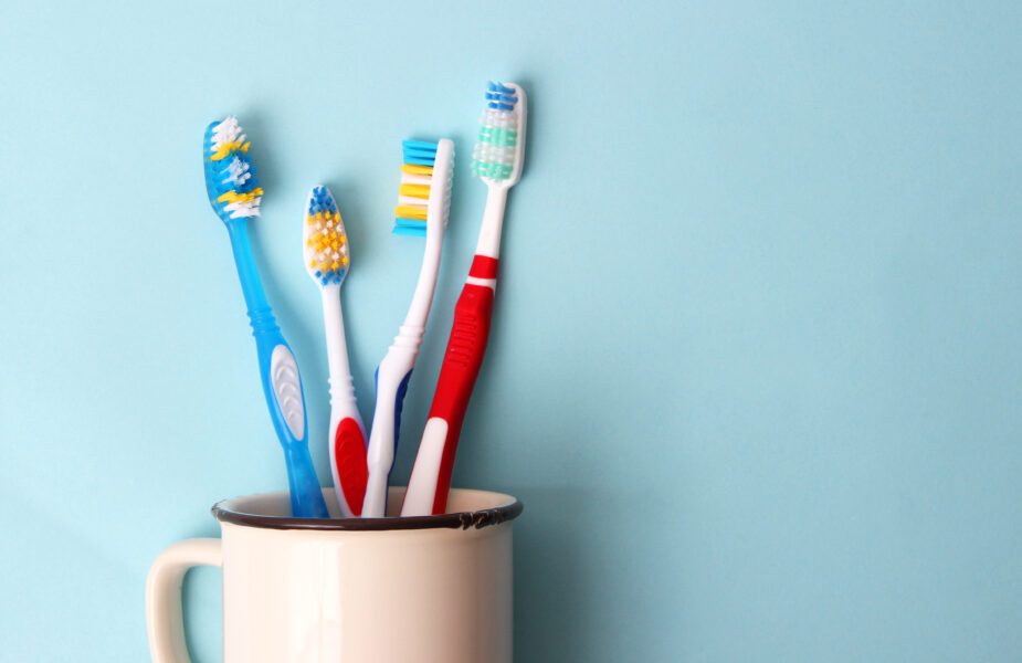 Toothbrushes in cup
