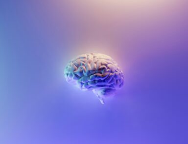 Image of a colorful animated brain on a purple background